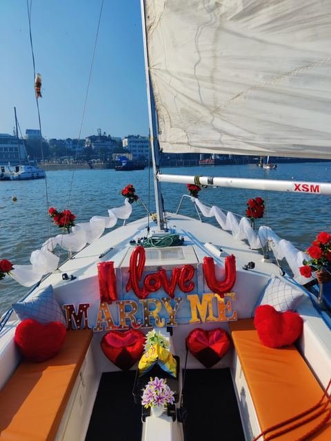 I love you, marry me proposal decor on a sailboat